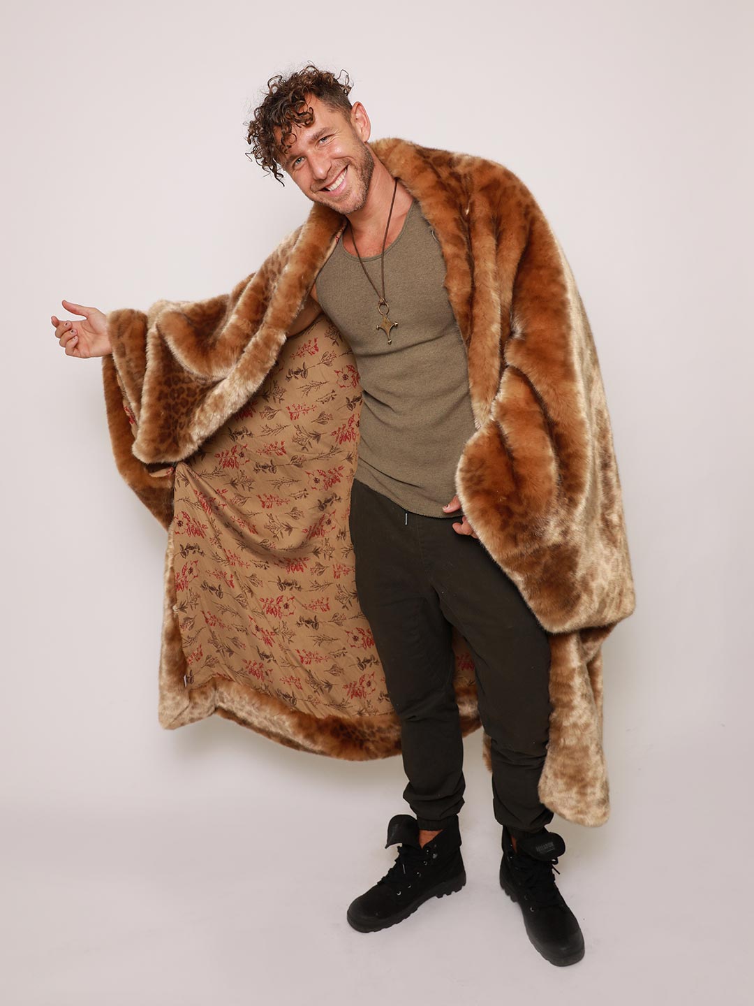 Man Holding African Golden Cat Luxe Faux Fur Throw