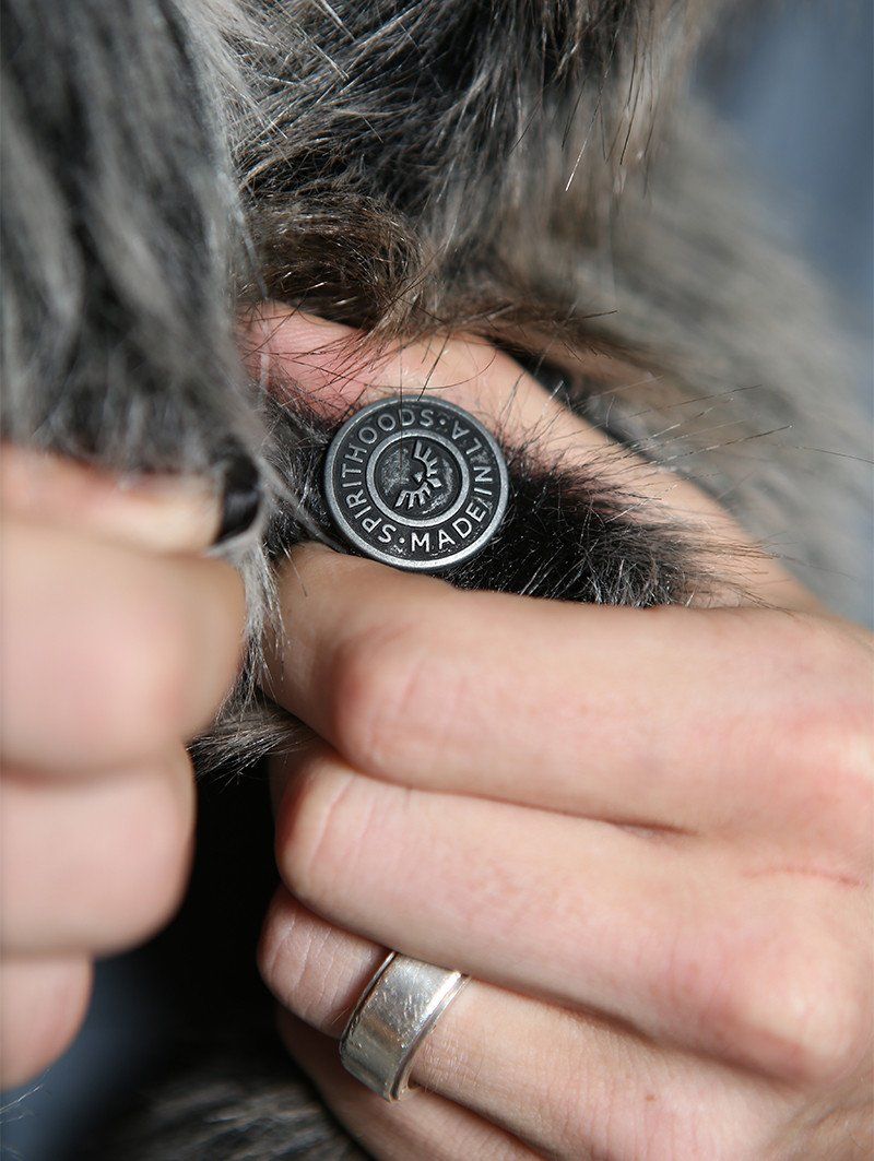 Man wearing faux fur Grey Wolf Ikat Collectors SpiritHood, front view 5