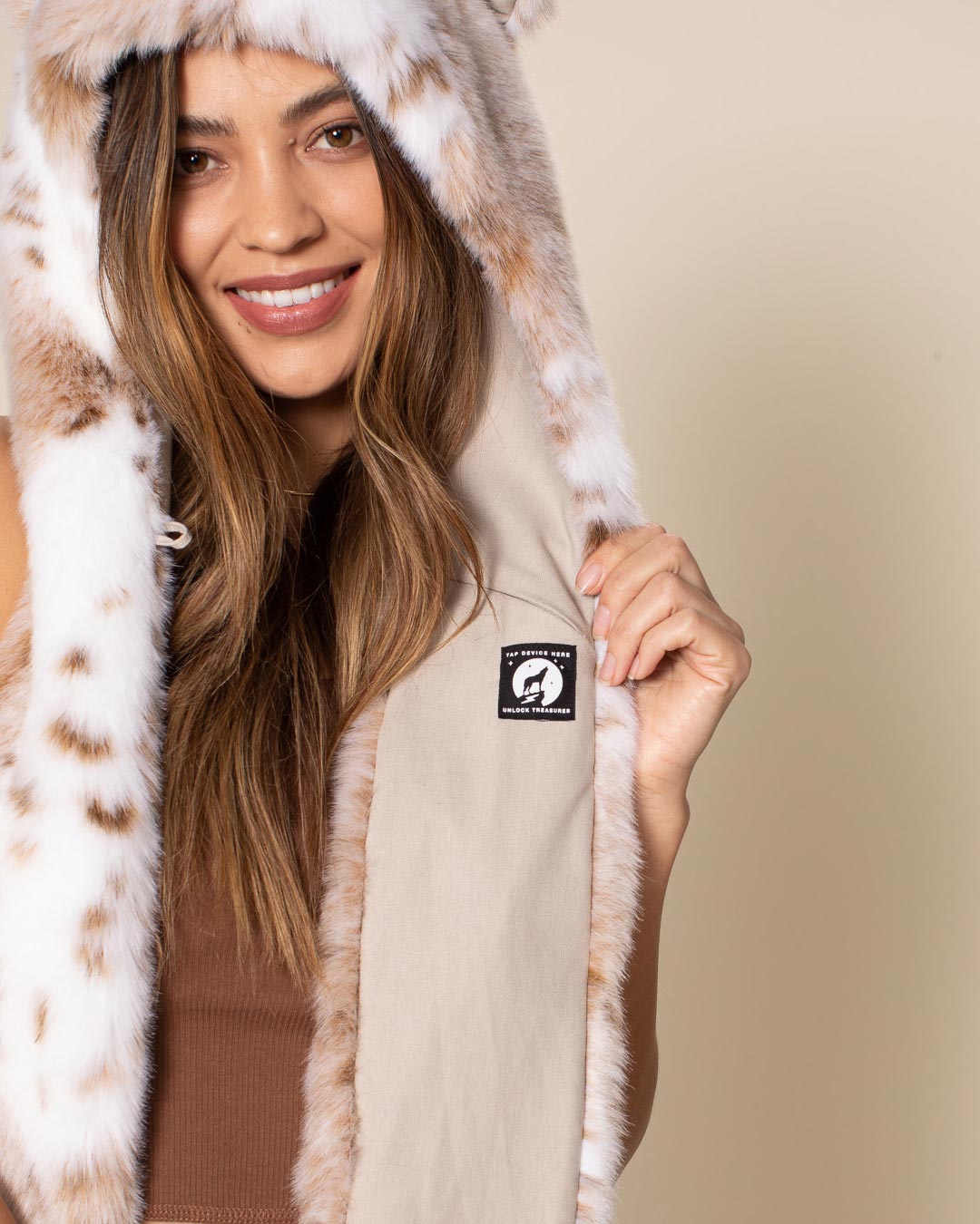 Brown and White Siberian Snow Leopard Faux Fur Hood on Female Model