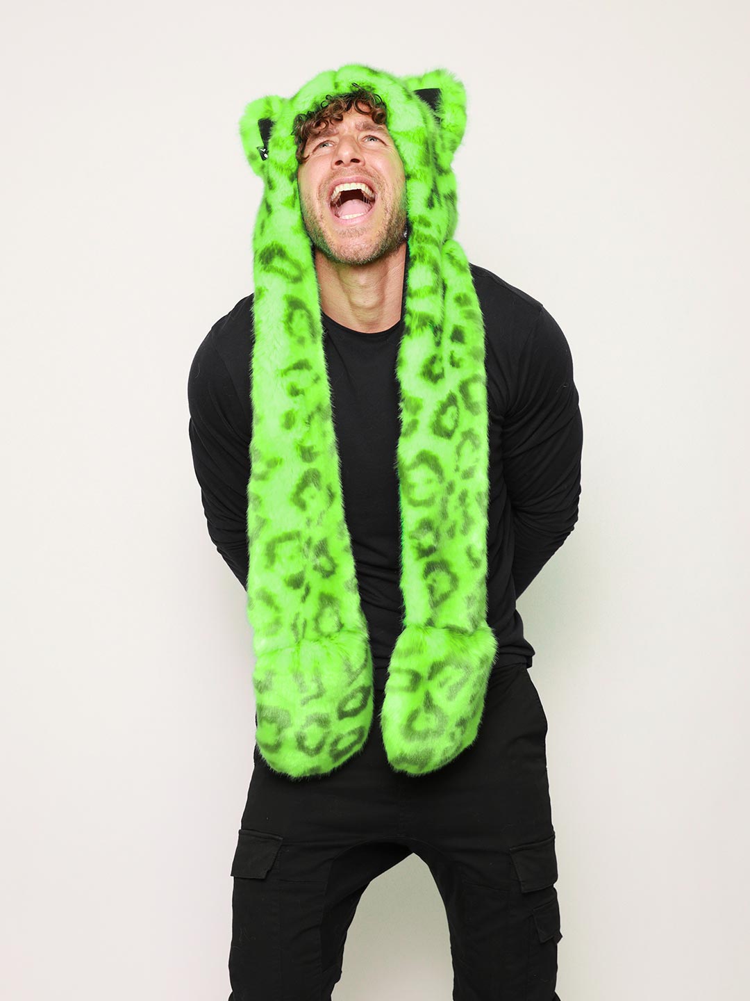 Man wearing Neon Green Leopard Luxe Collector Edition Faux Fur Hood, front view 2
