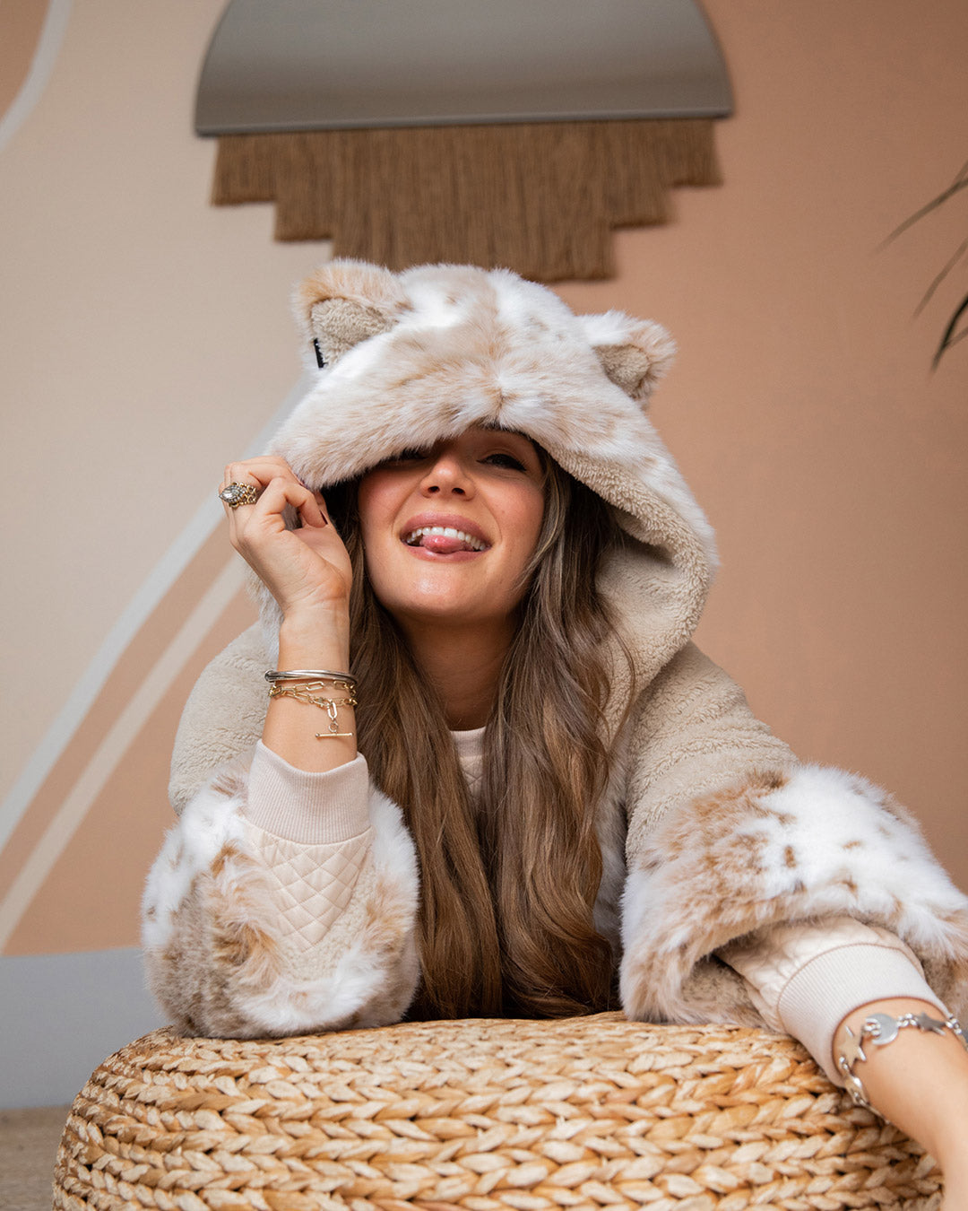 Woman wearing Snow Leopard Classic Faux Fur Robe, front view 1