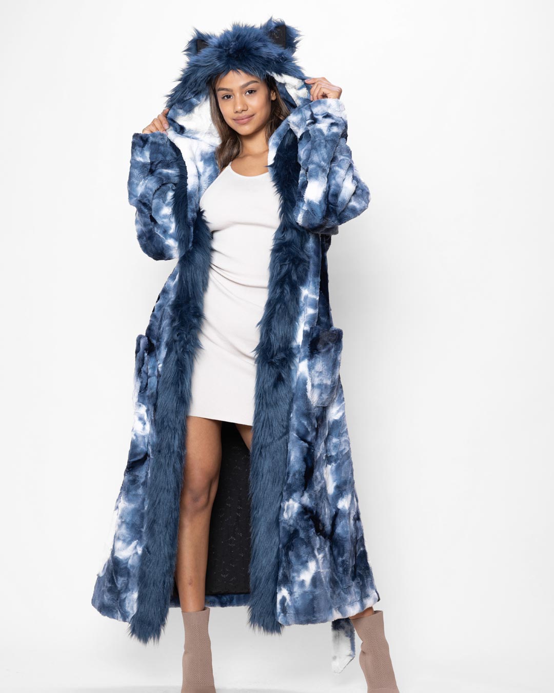 Blonde Model Holding Ears on Hood of Classic Faux Fur Robe Featuring Water Wolf Design