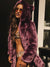 Woman wearing Lavender Wolf Luxe Classic Faux Fur Coat, side view 2