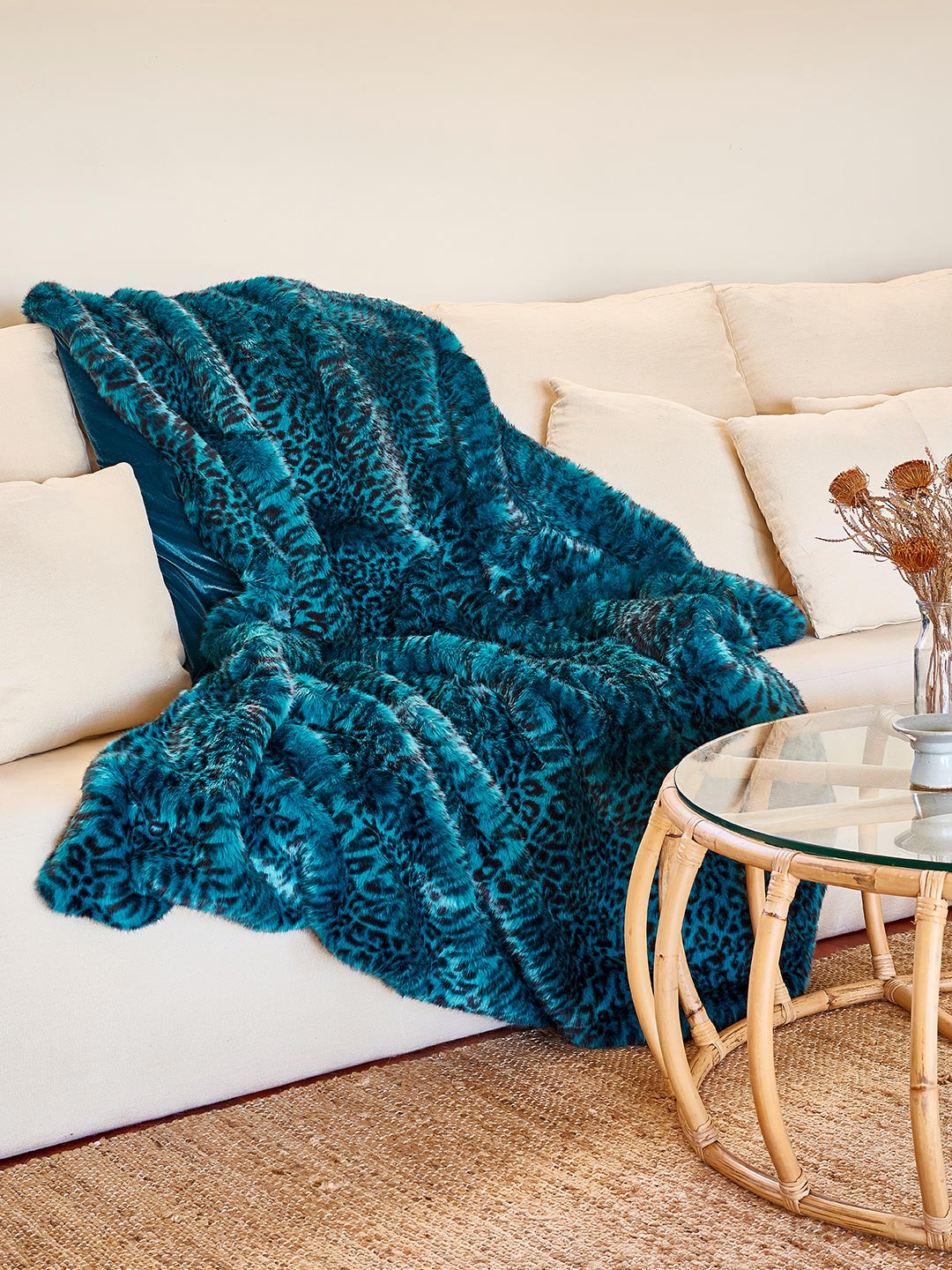 Ice Leopard Luxe Faux Fur Throw on Couch