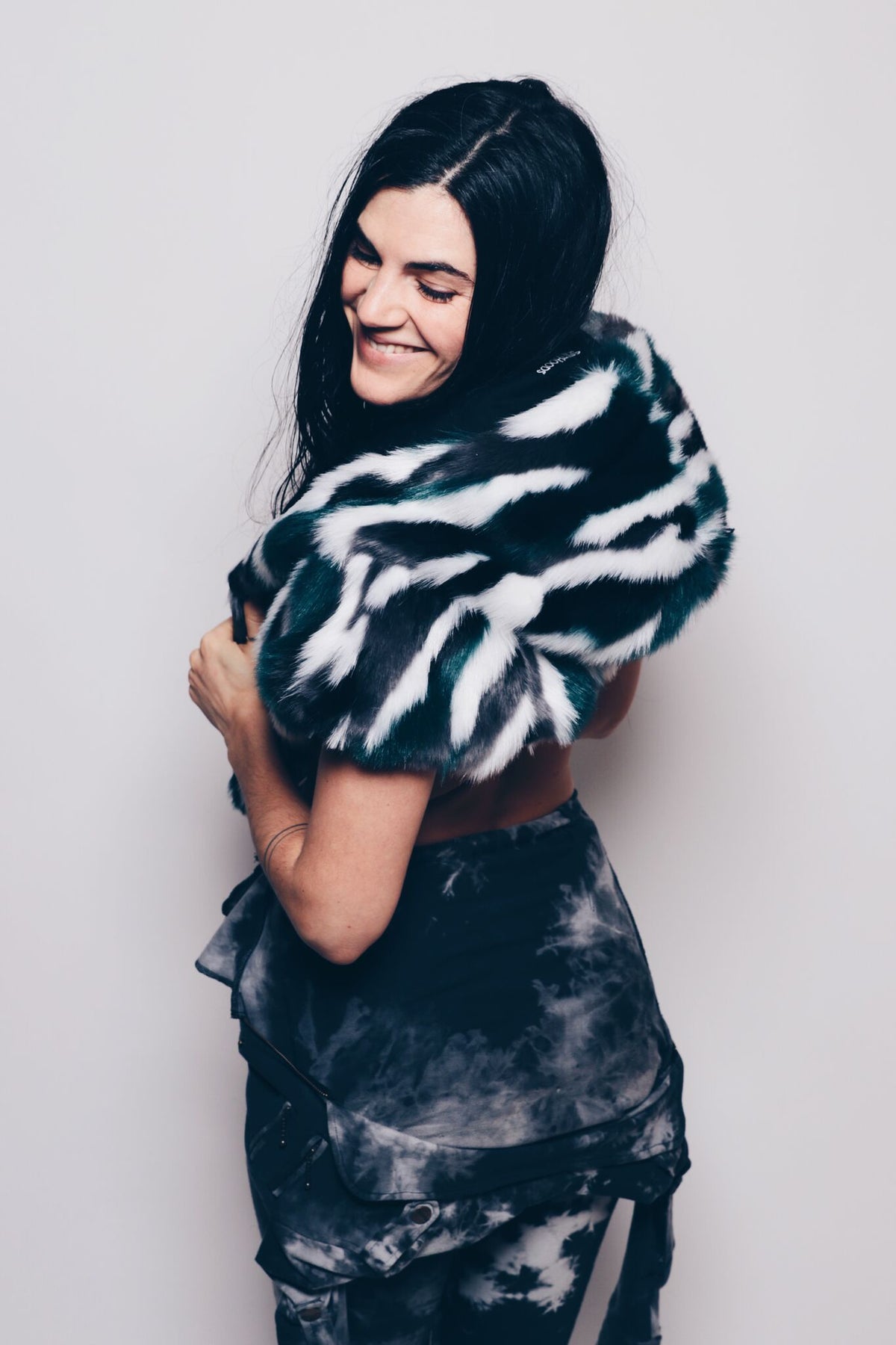 Woman wearing Faux Fur Limited Edition Lapwing Shawl 2.0 SpiritHood, side view