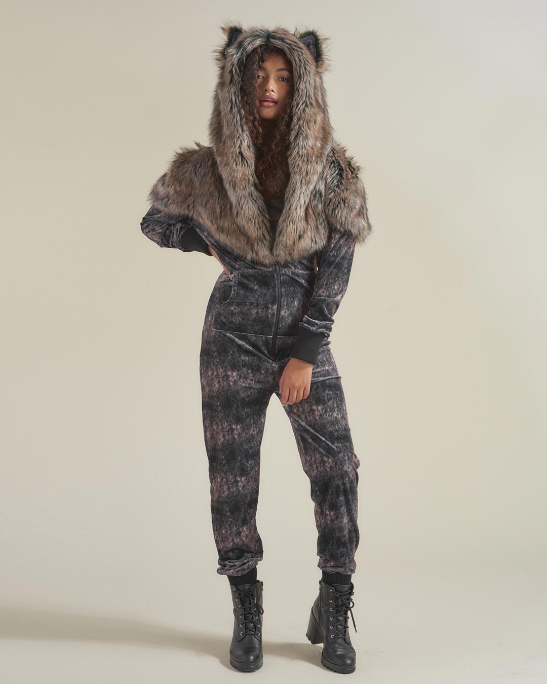 Woman wearing Grazer Wolf Artist Edition Faux Fur Animal Onesie, front view 1