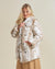 Blonde Model Shows Outside Pocket Feature on Siberian Snow Leopard Faux Fur Coat with Collar