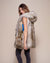 Woman wearing Alaskan Hawk Hooded Faux Fur Vest, side view
