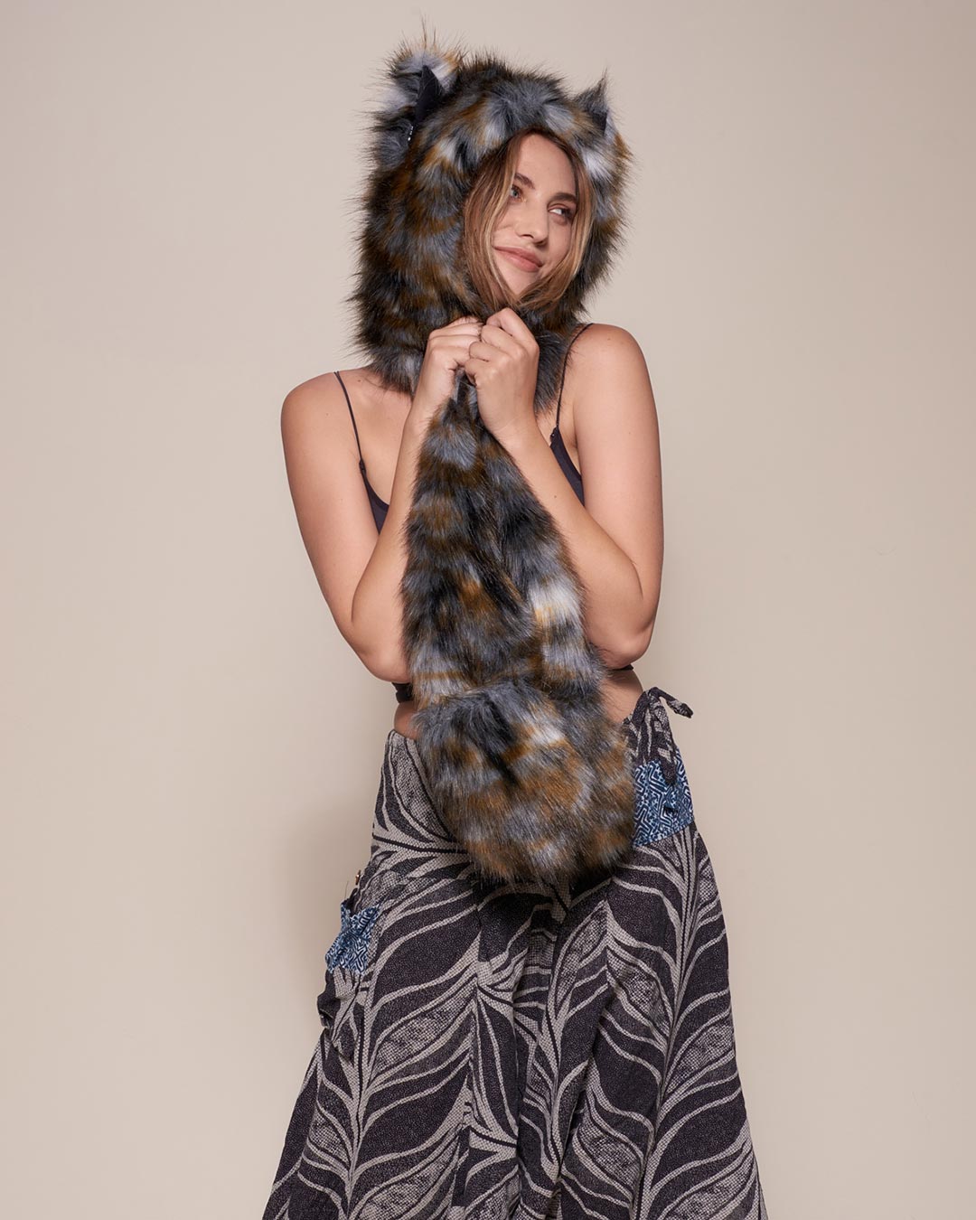 Woman wearing Brindle Wolf Collector Edition Faux Fur Hood, front view 2