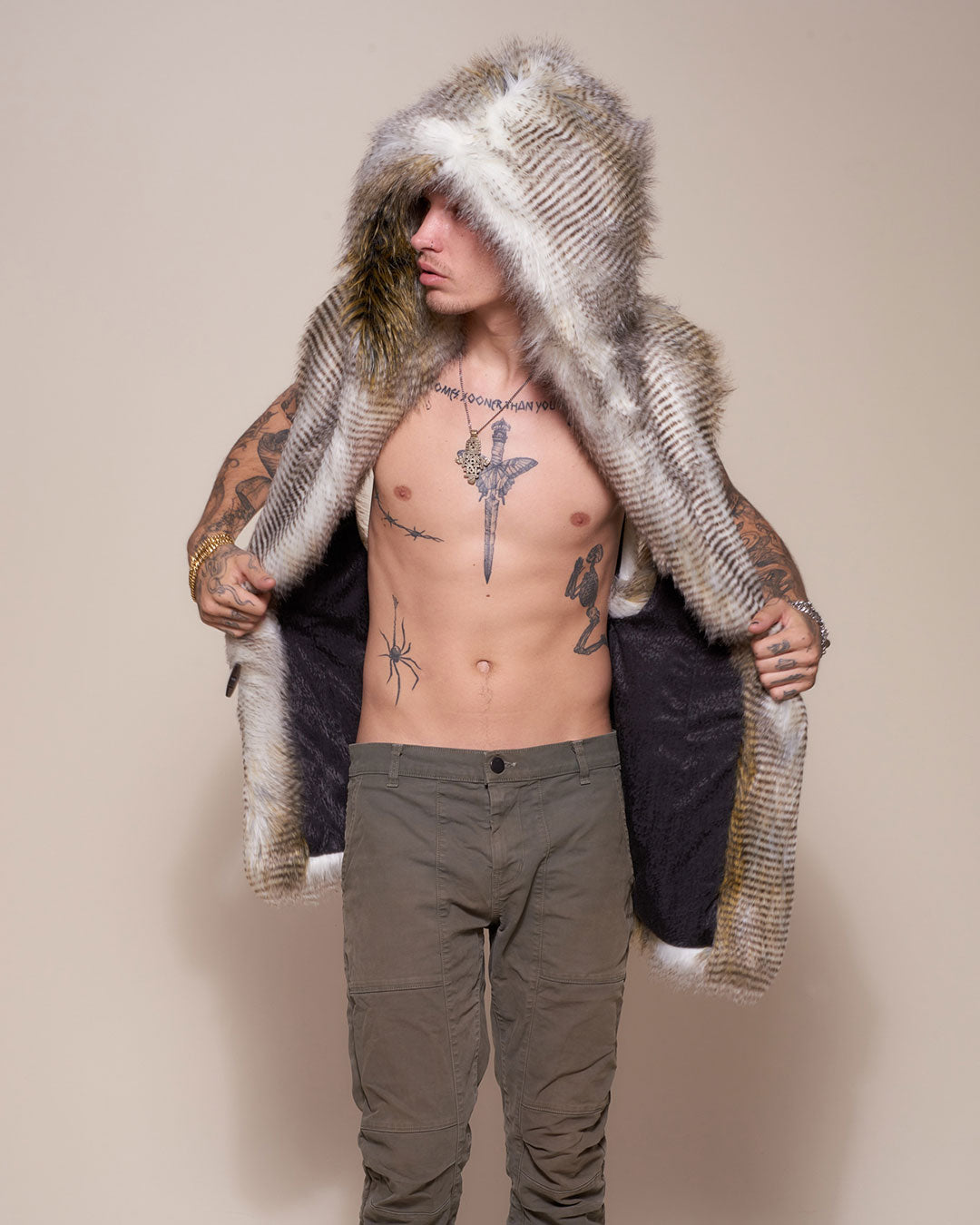 Man wearing Alaskan Hawk Hooded Faux Fur Vest, front view 1
