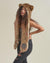 Woman wearing African Golden Cat Luxe Faux Fur Collector Edition Hood, side view 2