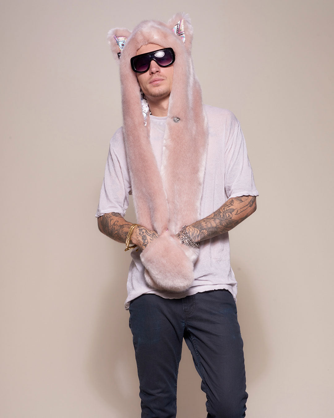 Man wearing faux fur Rose Quartz Wolf Luxe Collector Edition SpiritHood, front view 2