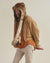 Man wearing African Golden Cat Luxe Faux Fur Collector Edition Hood, side view 3