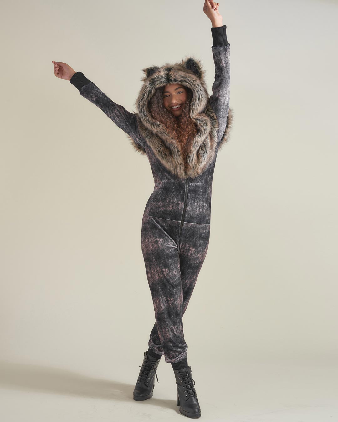 Woman wearing Grazer Wolf Artist Edition Faux Fur Animal Onesie, front view 2