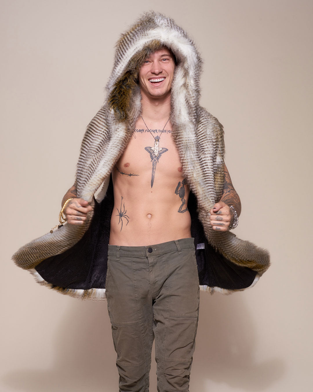 Man wearing Alaskan Hawk Hooded Faux Fur Vest, front view 2