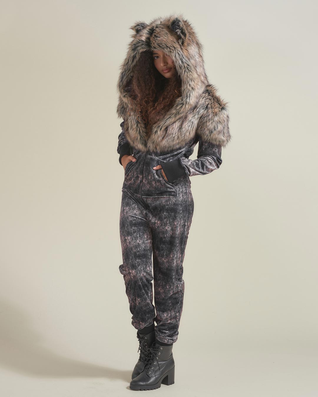 Woman wearing Grazer Wolf Artist Edition Faux Fur Animal Onesie, front view 5