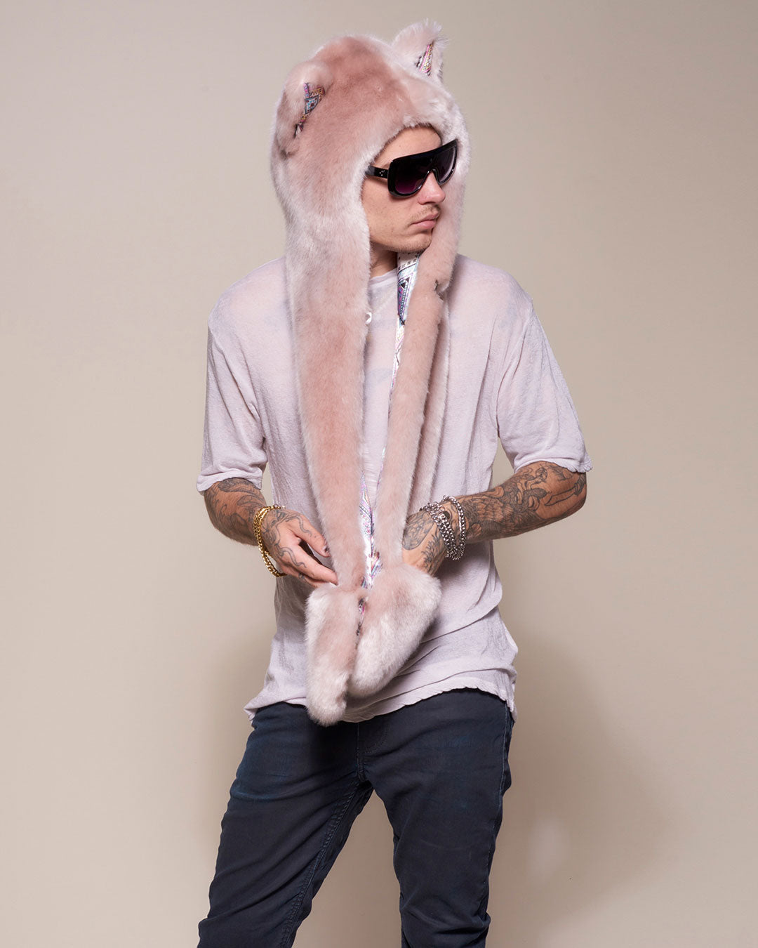 Man wearing faux fur Rose Quartz Wolf Luxe Collector Edition SpiritHood, side view