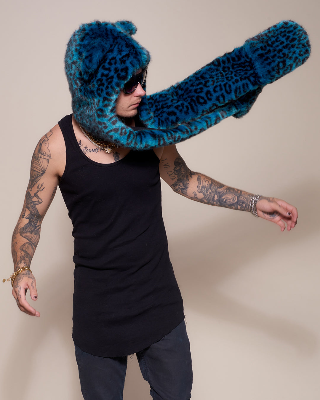 Man wearing faux fur Ice Leopard Luxe Collector Edition SpiritHood, side view 1