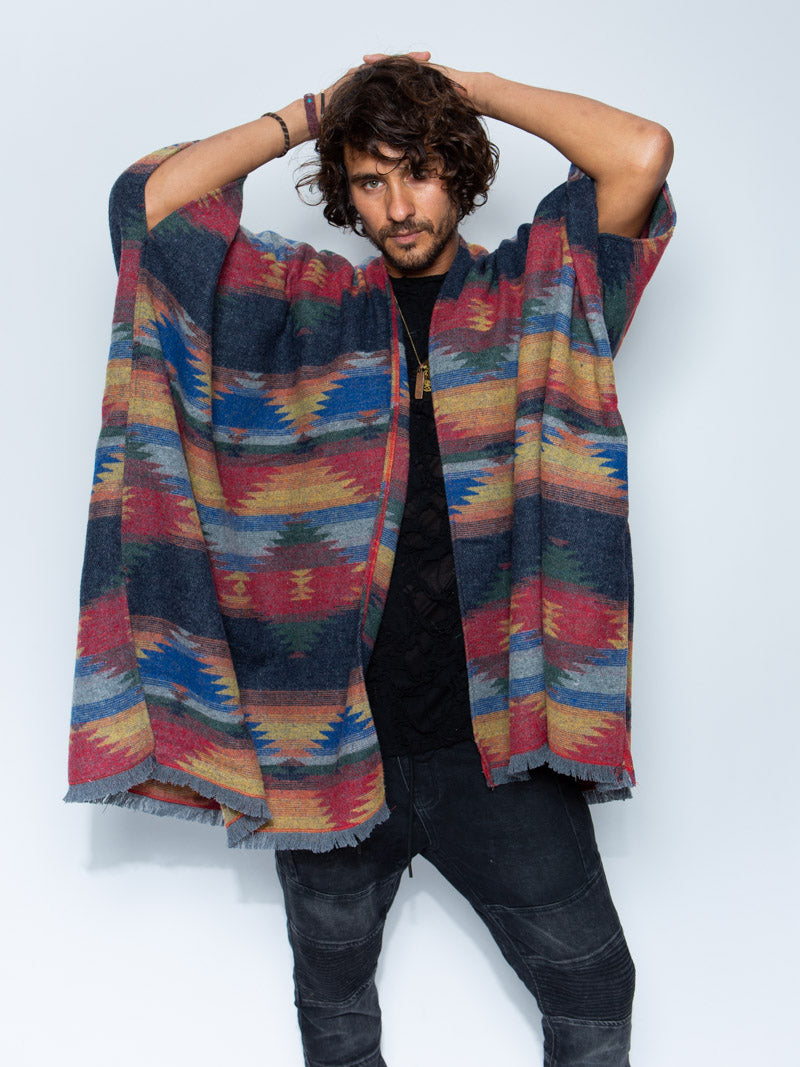Man wearing Dire Wolf Fabric Poncho, front view 3