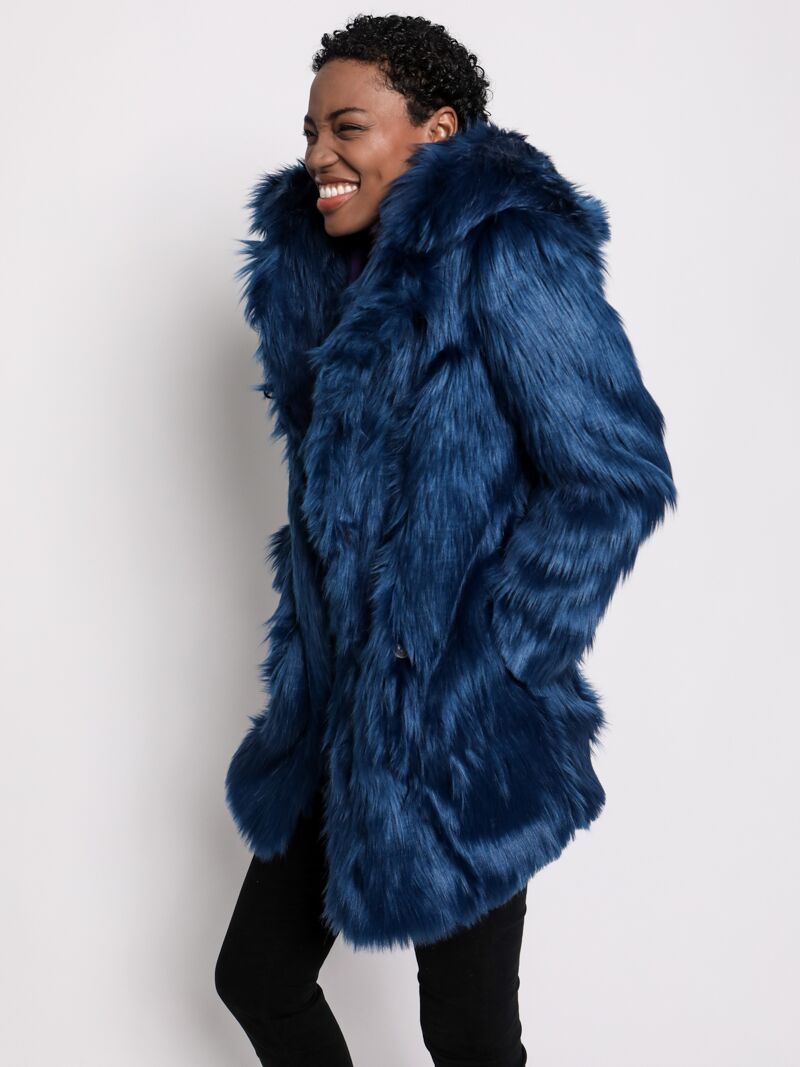 Female Model Laughs While Featuring Water Wolf Design on a Classic SpiritHoods Faux Fur Coat
