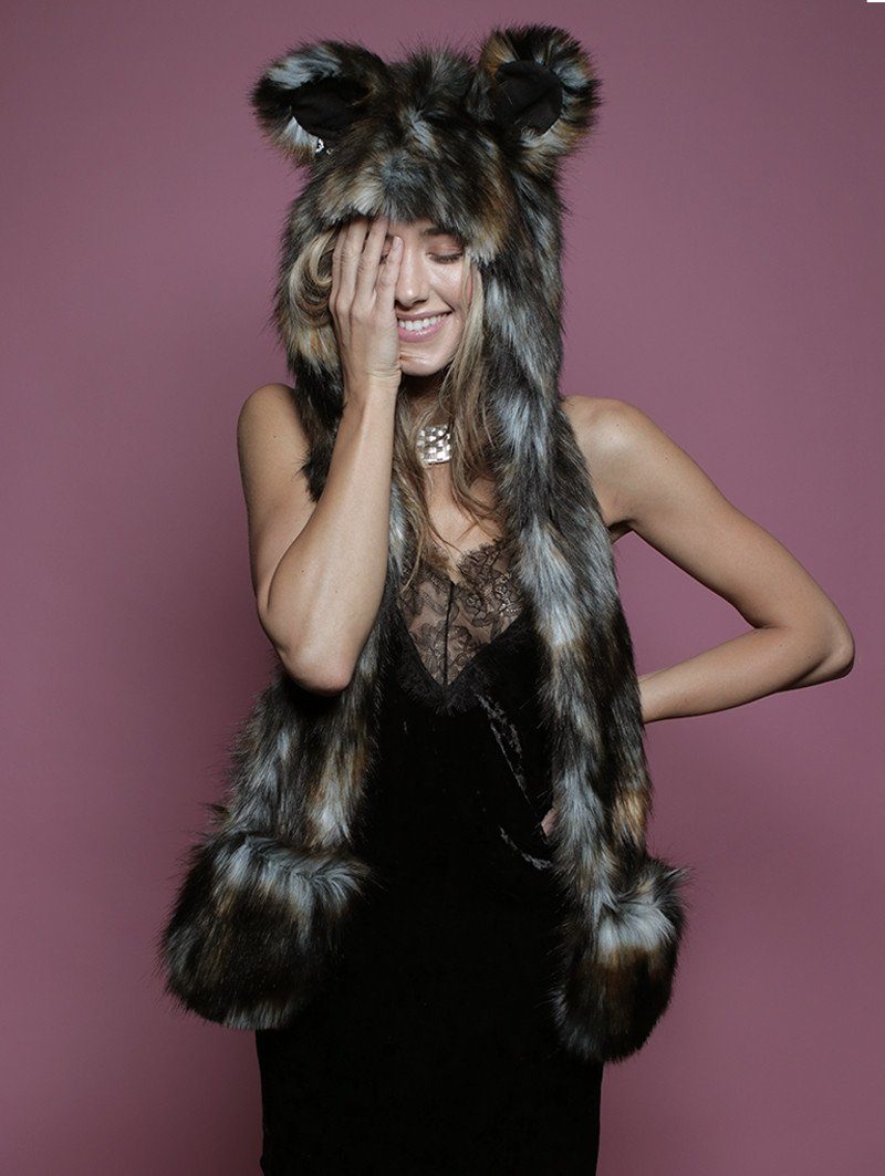 Woman wearing faux fur African Wild Dog Collector SpiritHood, front view 2