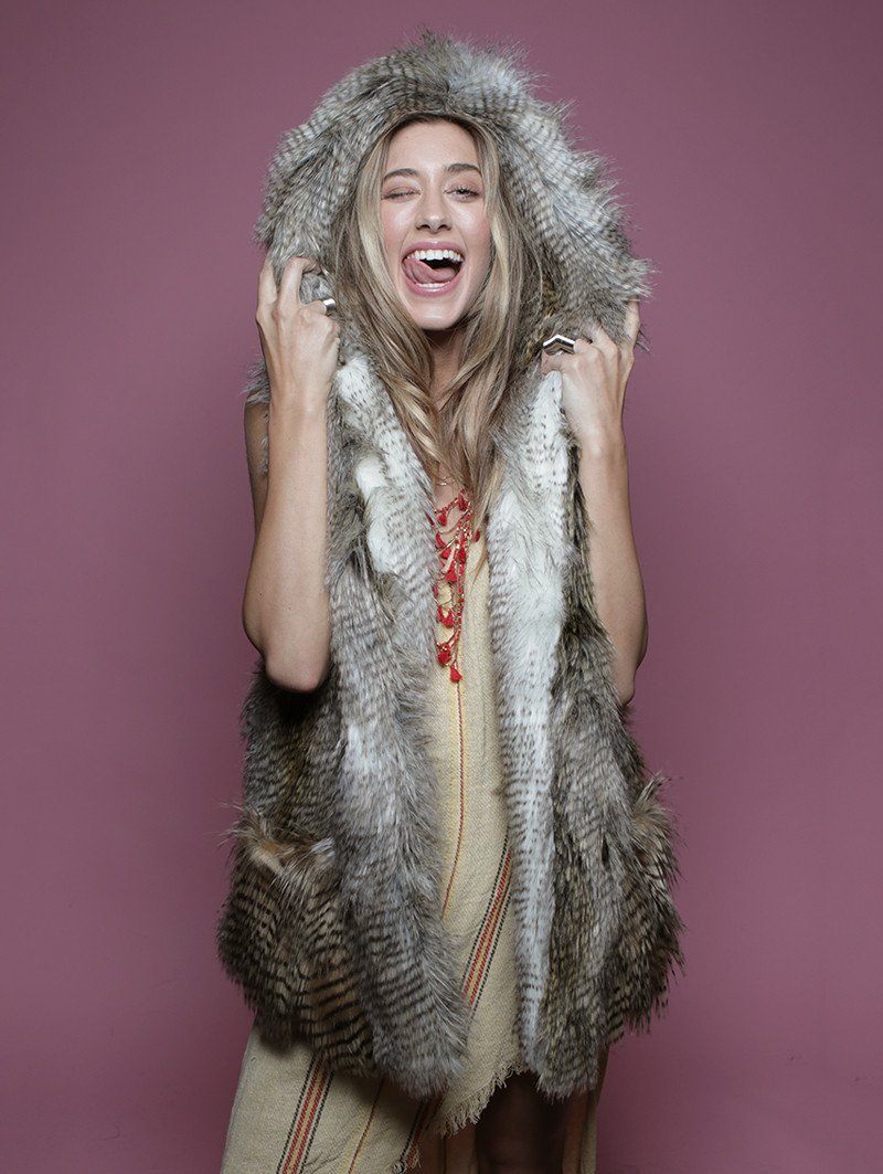 Woman wearing Alaskan Hawk Hooded Faux Fur Vest, front view 1