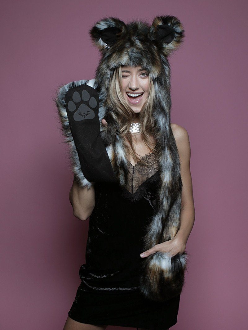 Woman wearing faux fur African Wild Dog Collector SpiritHood, front view