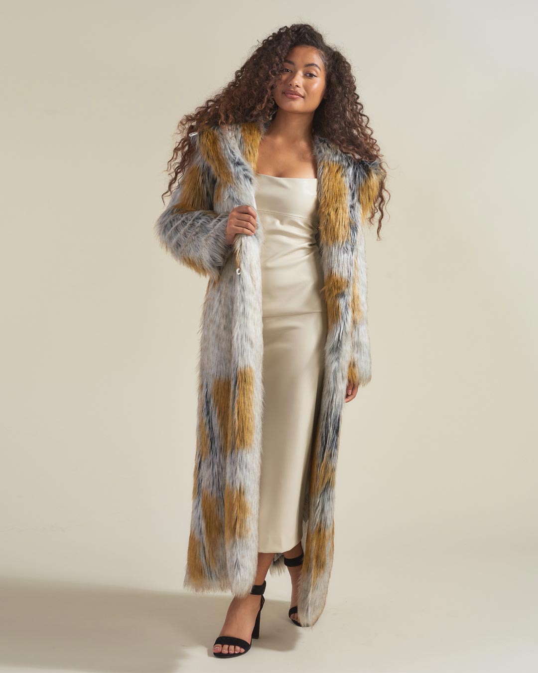 Woman wearing Arctic Fox Classic Faux Fur Long Coat, front view 3