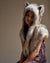 Woman wearing Arctic Fox Collector Edition Faux Fur Shawl, side view 1