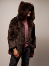 Man wearing Limited Edition Brown Bear Faux Fur Coat, side view