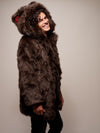 Man wearing Limited Edition Brown Bear Faux Fur Coat, side view 1