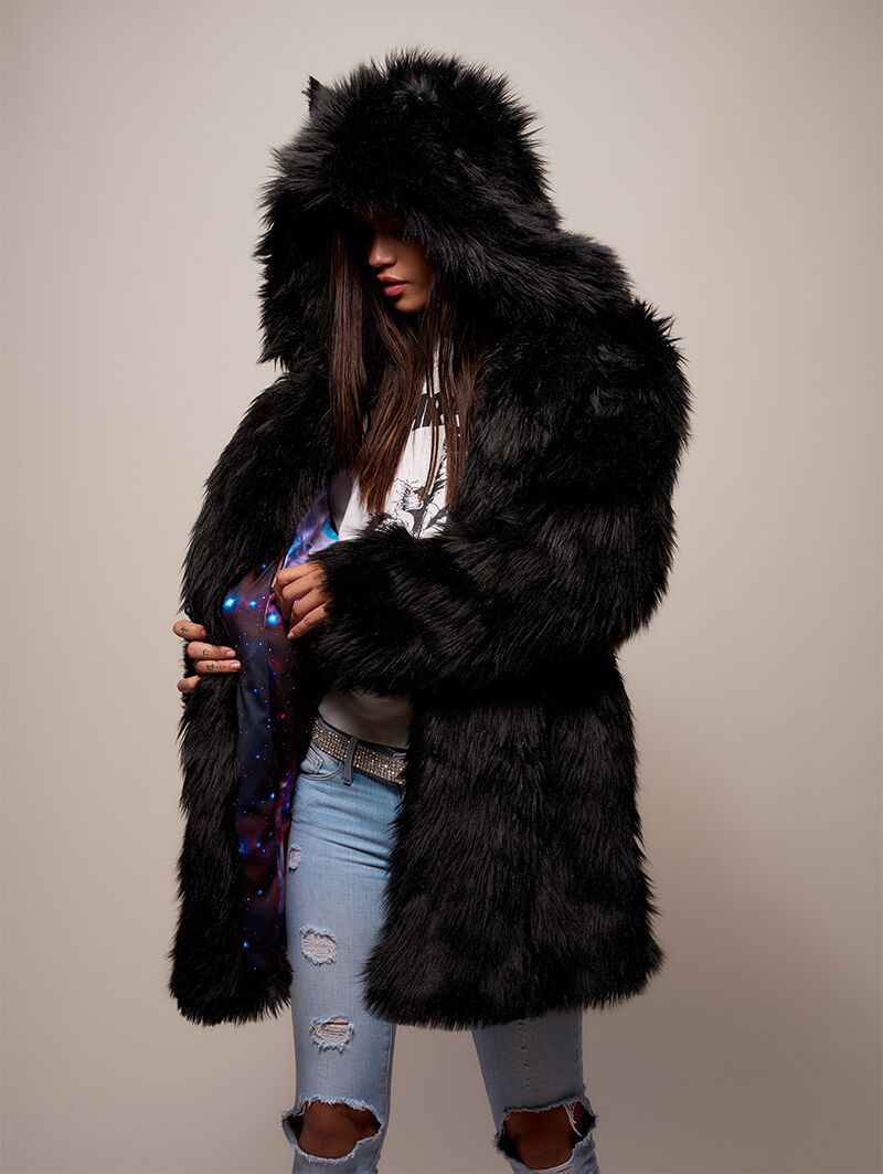 Woman wearing Black Wolf Galaxy Faux Fur Coat, side view 1