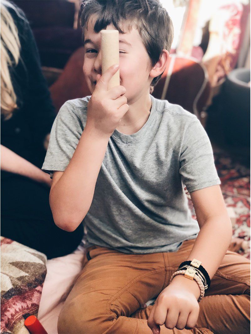 Young Boy Wearing Gold Phoenix Bracelet