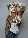 Woman wearing faux fur Cheetah Crop Jacket SpiritHood, front view 2