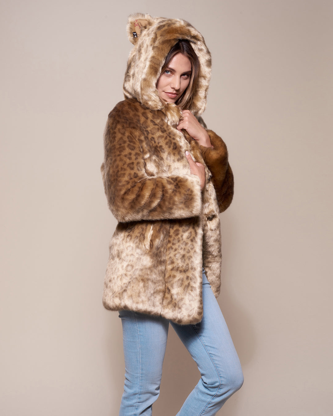 Woman wearing African Golden Cat Luxe Classic Faux Fur Coat, side view 2
