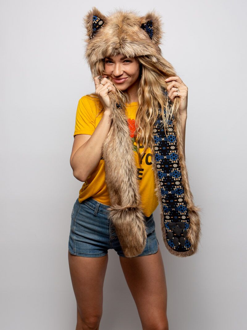 Woman wearing faux fur Collector Edition Coyote SpiritHood, front view 1