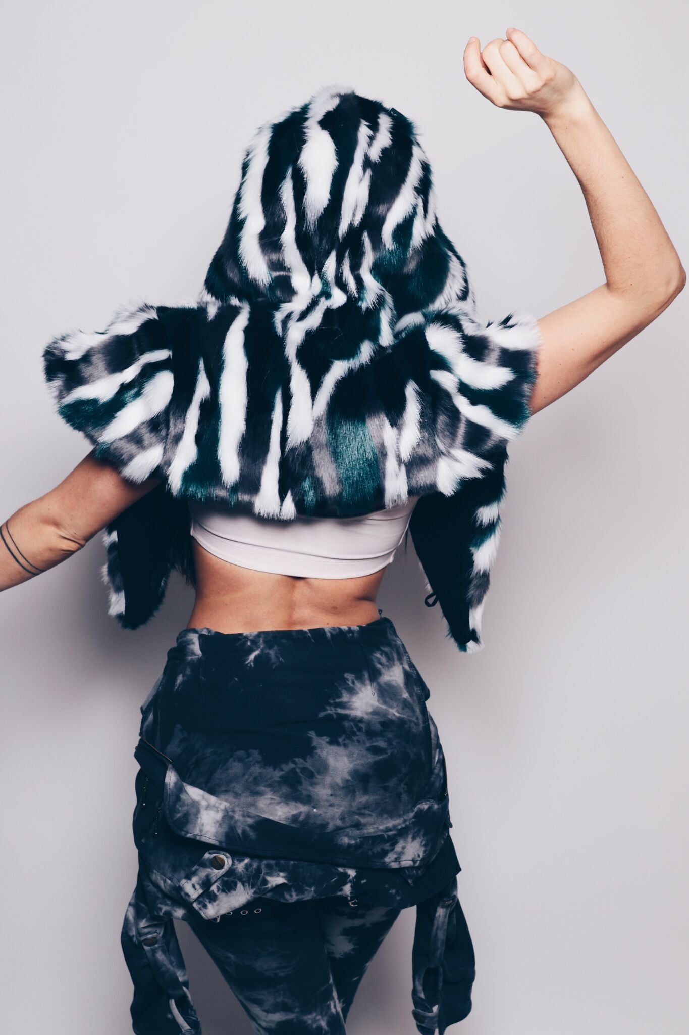 Woman wearing Faux Fur Limited Edition Lapwing Shawl 2.0 SpiritHood, back view