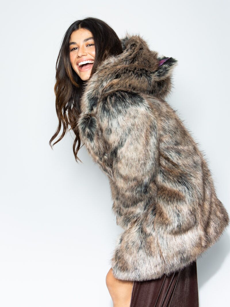 Woman wearing faux fur Direwolf Galaxy Collector Edition Coat, side view