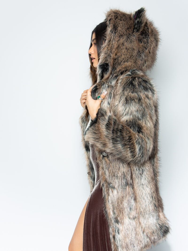Woman wearing faux fur Direwolf Galaxy Collector Edition Coat, side view 1