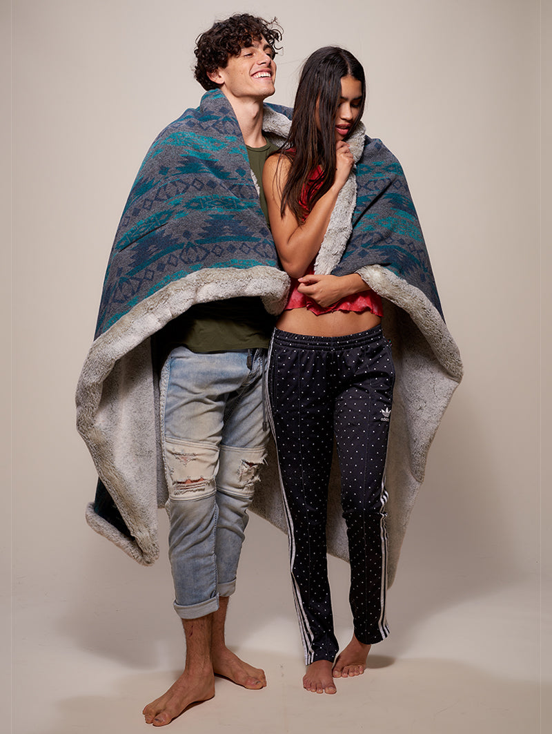 Male and Female Models Wrapped in Grey Fox Italy Faux Fur Throw 