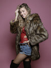 Female Wearing Grizzly Golden Galaxy Faux Fur Coat 