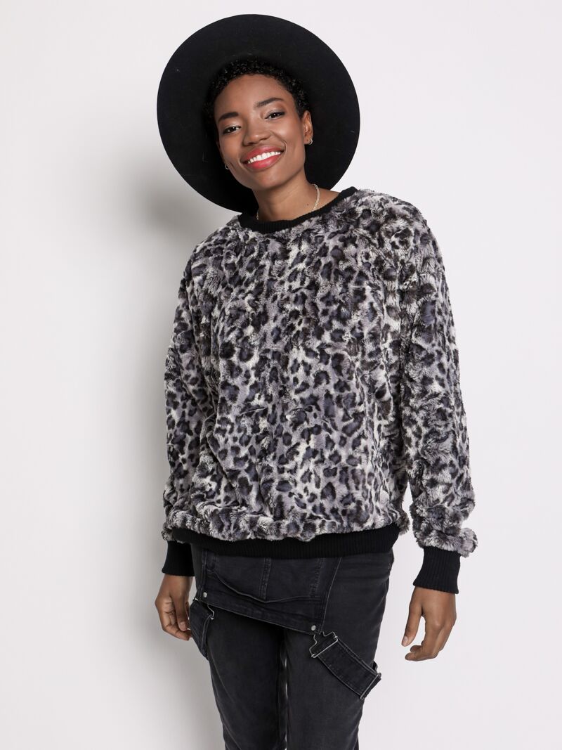 Woman wearing Bobcat Luxe Sweater, front view
