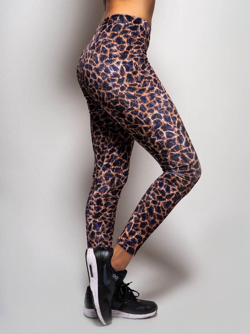 Side View of Purple Cheetah Velvet Leggings on Woman