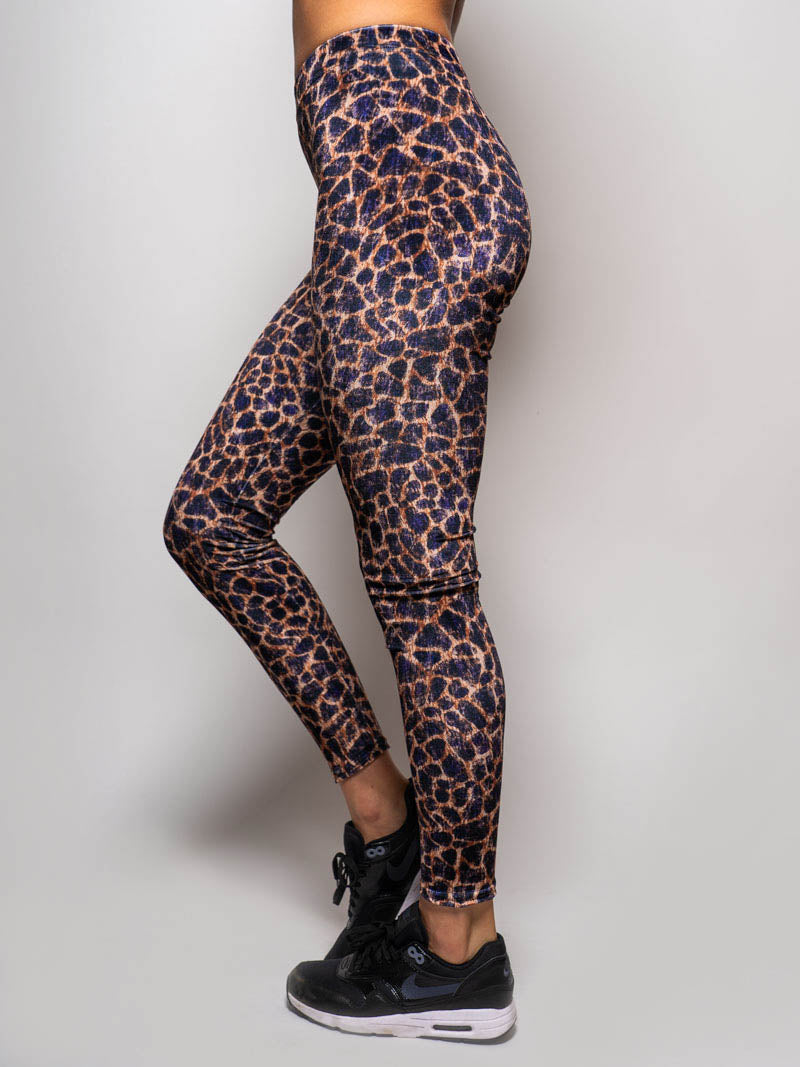 Woman Wearing Purple Cheetah Velvet Leggings