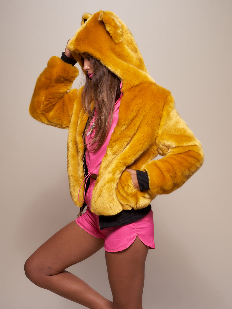 Woman wearing faux fur Golden Wolf Luxe Classic Bomber Jacket, side view
