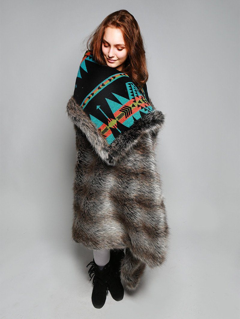 Woman wearing faux fur Grey Wolf Reverse Throw, front view