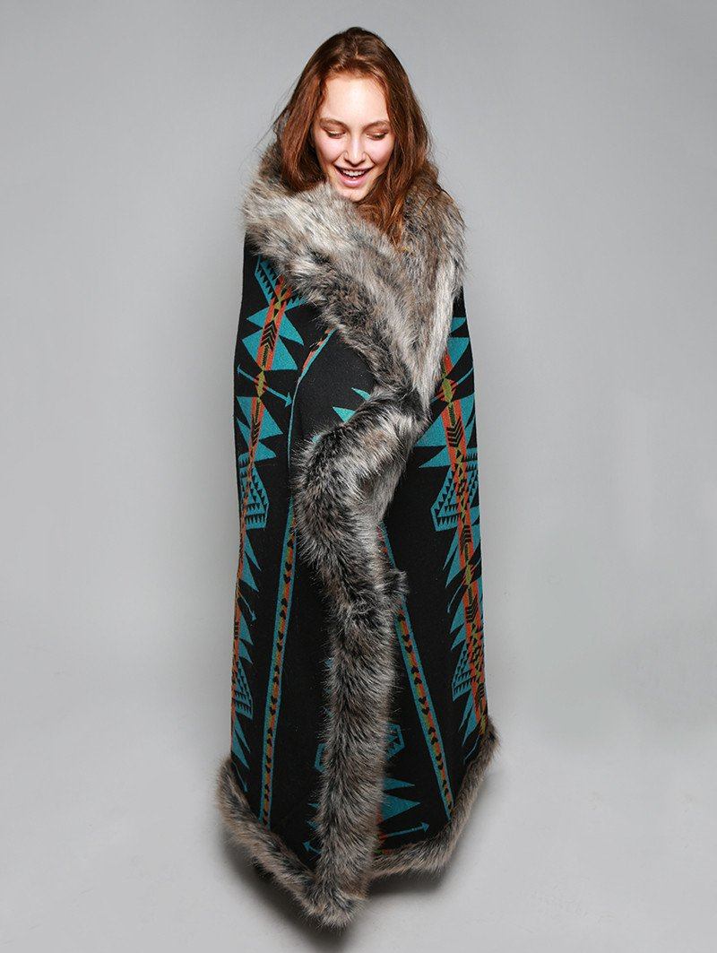 Woman wearing faux fur Grey Wolf Reverse Throw, front view 1