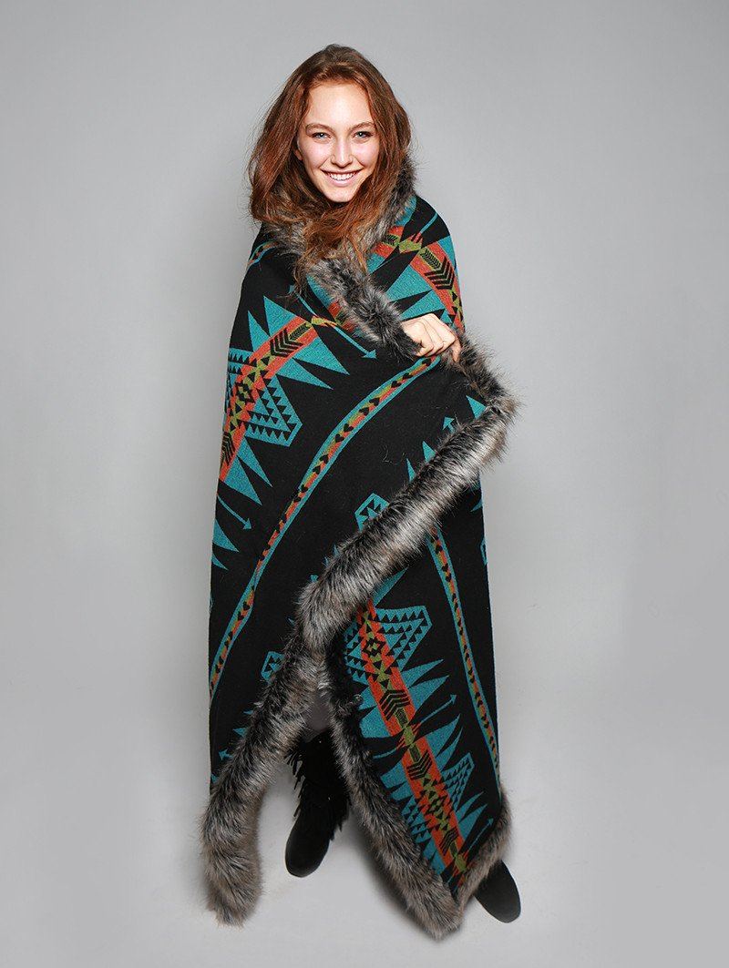 Woman wearing faux fur Grey Wolf Reverse Throw, front view 3