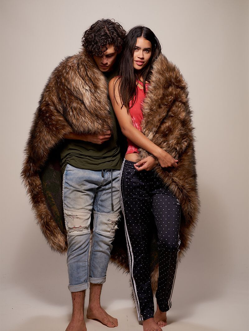 Male and Female Models Wrapped In Grizzly Faux Fur Throw 
