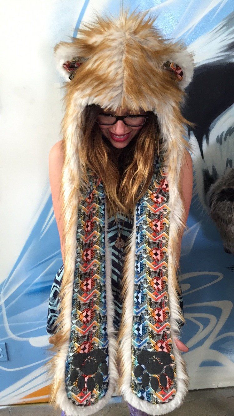 Woman wearing faux fur Adventure Sunset Bear SpiritHood showing liner interior